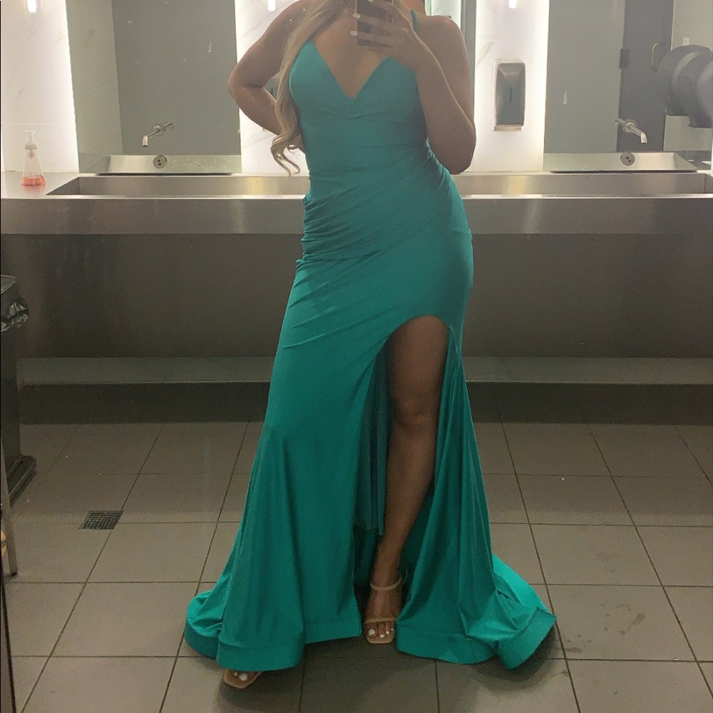 Maxi dress with slit and open cross back with tail